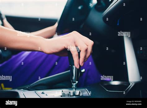 Close Up Young Woman Hand On Automatic Gear Shift Shifting Gearbox In
