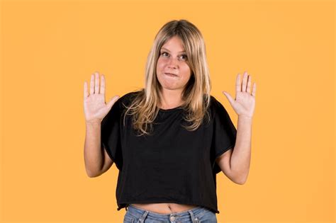 Free Photo Portrait Of Young Disable Woman Showing No Gesture On Sign