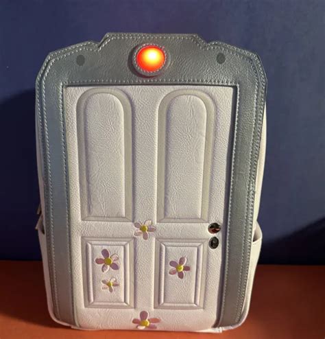 Loungefly Disney Pixar Monsters Inc Boos Door Light Up Mini Backpack