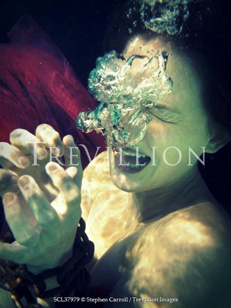 Trevillion Images The Ultimate Creative Stock Photography Stephen Carroll Drowning Woman In