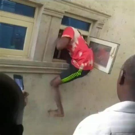 Suspected Thief Forced To Demonstrate How He Gained Access Into A House After Being Caught Video