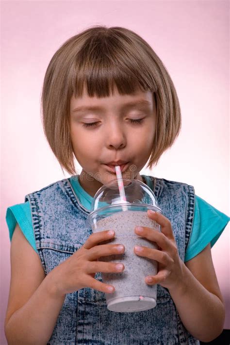 Funny Little Girl Drinks Milkshake Stock Photos Free And Royalty Free