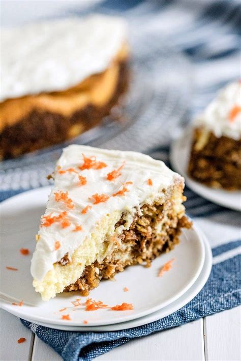 A Slice Of Carrot Cake On A Plate With The Rest Of The Cake In The