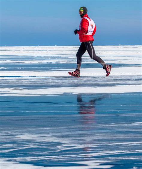 Worlds Most Extreme Marathon Runners Travel Over Frozen Lake In