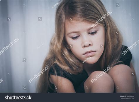 Portrait Sad Little Girl Sitting Near Stock Photo 584886844 Shutterstock