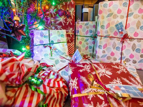 Our christmas gifts for girls will be even more surprising because they'll be personalized just for her. File:Christmas presents under the tree (11483648553).jpg ...