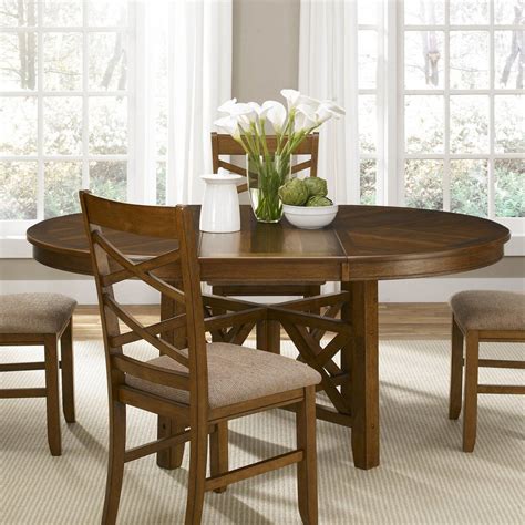 Aerin jacqueline chandelier elegantly sets a classic tone over a round bistro table and french blue velvet chairs. Have to have it. Liberty Furniture Bistro Oval Pedestal ...