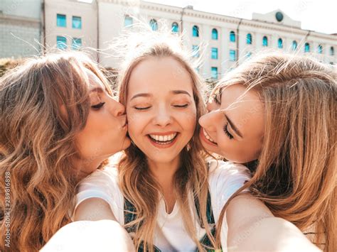 Three Young Smiling Hipster Women In Summer Clothesgirls Taking Selfie