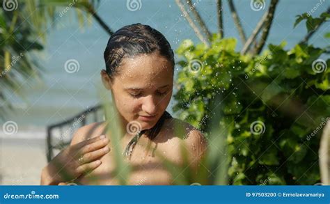 Beautiful Young Woman In Outdoor Shower Has A Washing On Summer