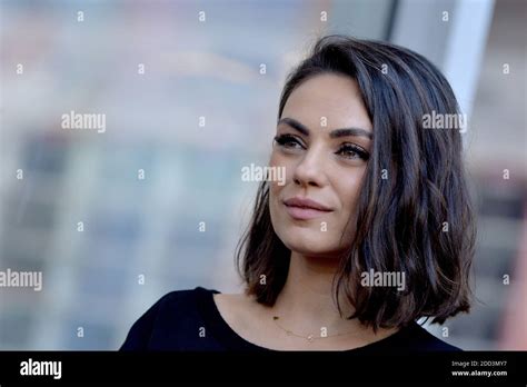 Mila Kunis Attends The Ceremony Honoring Zoe Saldana With A Star On The Hollywood Walk Of Fame