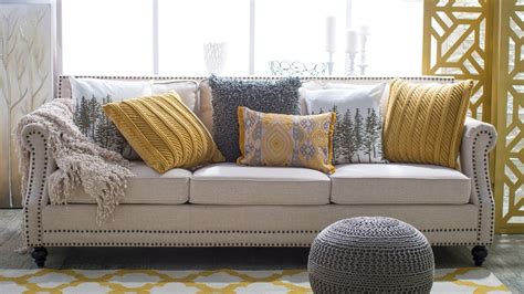 20 Beige Sofa With Yellow Pillows