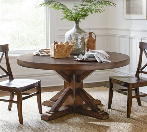 I am very interested in any. Benchwright Round Pedestal Extending Dining Table - Rustic ...