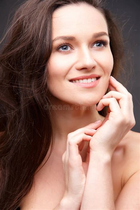 Close Up Portrait Of Elegant Brunette Woman With Nude Make Up Stock