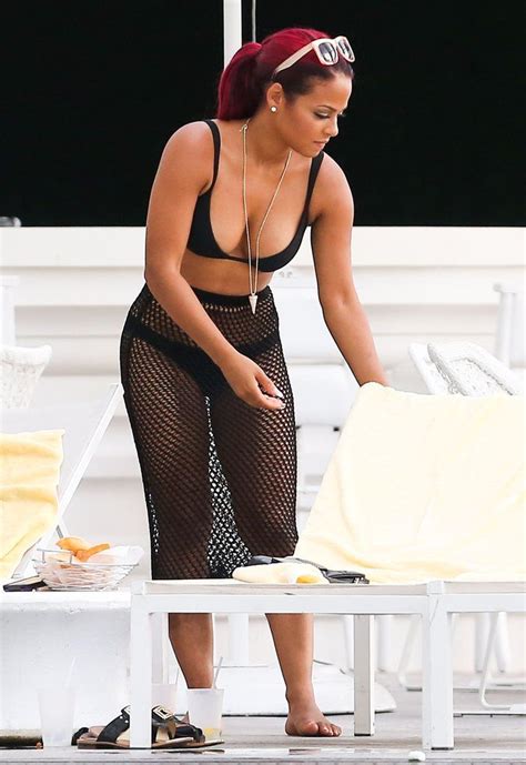 Christina Milian Rocks A Bikini And Fishnets During A Miami Pool Stop