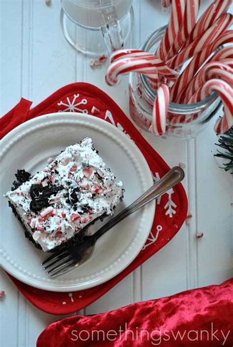 Remove the cakes from cake pans and cool. Better Than... Christmas Poke Cake - Something Swanky