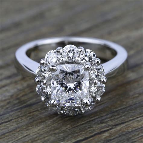 Diamonds direct offers the finest selection of engagement rings, wedding bands, loose diamonds, fine jewelry and more. Floral Halo Diamond Engagement Ring in Platinum