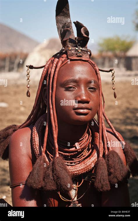 Himba Woman In A Village Near Epupa Falls Namibia Africa Stock Photo