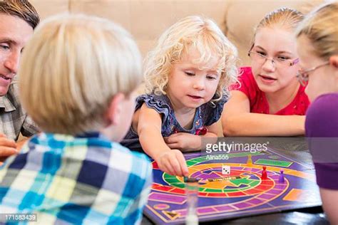 Group Of Kids Playing Board Game Photos And Premium High Res Pictures