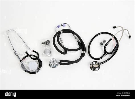 Three Stethoscopes On White Background Stock Photo Alamy