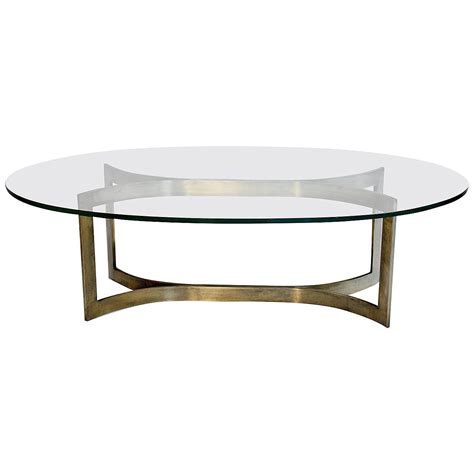 Get the best deals on oval coffee tables. Baker Bronze and Glass Oval Cocktail Table at 1stdibs