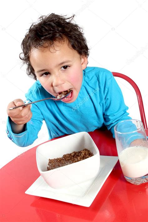 Little Boy Eating Breakfast Cereal ⬇ Stock Photo Image By