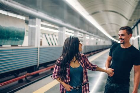 Premium Photo Young Man And Woman Use Underground Couple In Subway