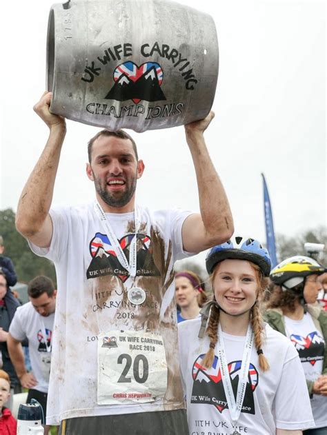 Uk Wife Carrying Contest Takes Place In Dorking Bbc News