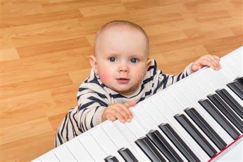 Cute Little Baby Plays Piano Stock Photo Image Of Background Music