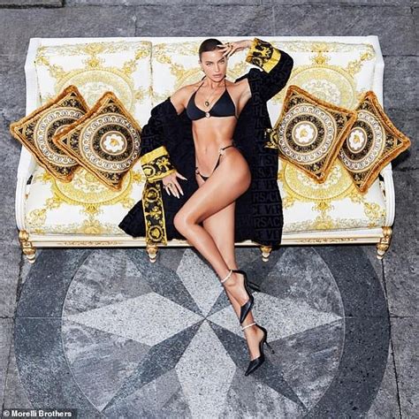 Irina Shayk Strips Down To A Skimpy Black Bikini At The Versace House