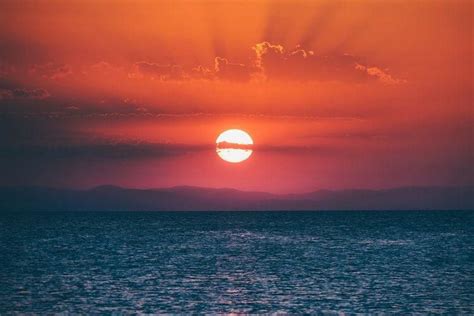 在日落期间的海洋视图 Manzara Fotoğrafçılığı Plaj Resimleri Resimler