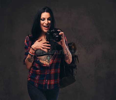 Tattooed Girl Wearing A Red Unbuttoned Checked Shirt Wearing A Vr