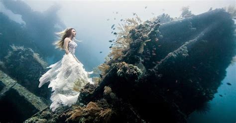 Models Dive 25 Meters To An Underwater Shipwreck In Bali For A