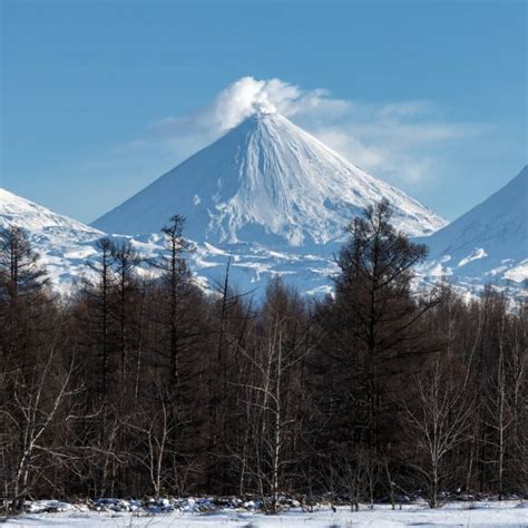 Klyuchevskoy Volcano And Kamen Volcano On The Kamchatka Peninsula