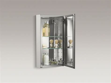 The cabinet can be surface or recess mounted (in 13.25' w x 23.25' h opening) to fit easily in any bathroom. 15" W x 26" H aluminum single-door medicine cabinet with ...