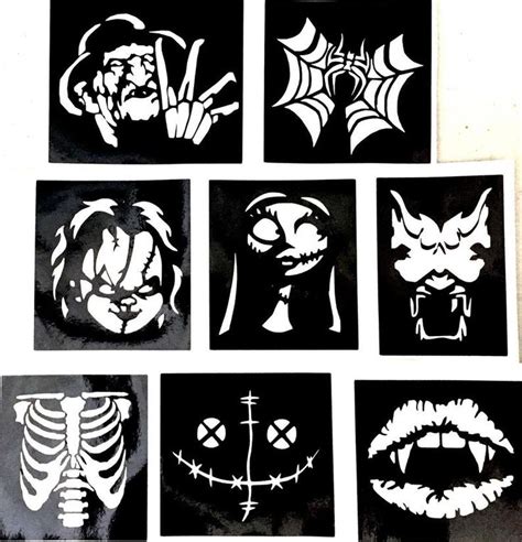 Six Halloween Stencils Are Shown In Black And White With Different