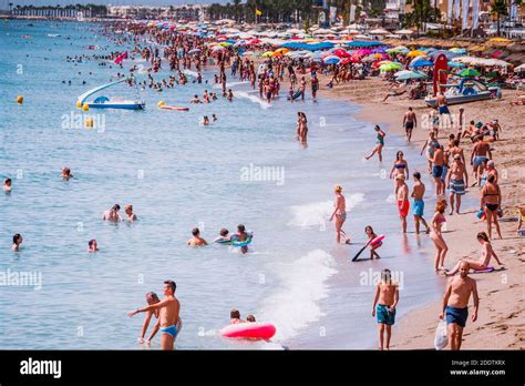 Holidaymakers On The La Carihuela Beach Torremolinos M Laga Costa De Sol Andalucia Spain