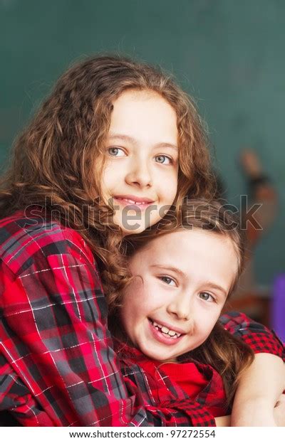 Two Little Sisters Hugging Stock Photo 97272554 Shutterstock