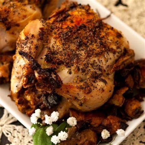 What to serve with cornish hen. Cooked garlic & sage Cornish game hens on a plate ...
