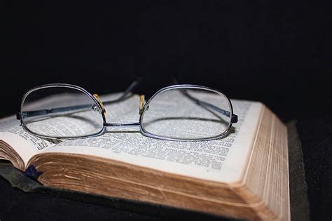 Royalty Free Photo Eyeglasses With Silver Frame On Book Page Pickpik