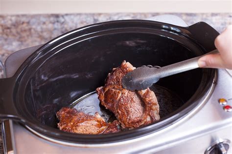 How about trying the method i use for barbecue ribs where you steam them in a covered roasting pan with a little beer. Can I Cook Ribeye Steaks in a Crock Pot? | LIVESTRONG.COM