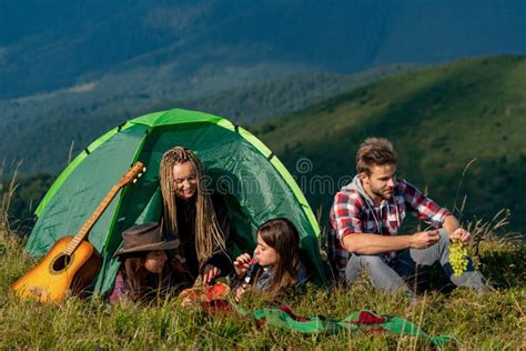 Young People On Camping Trip Healthy Lifestyle And Eco Tourism Stock