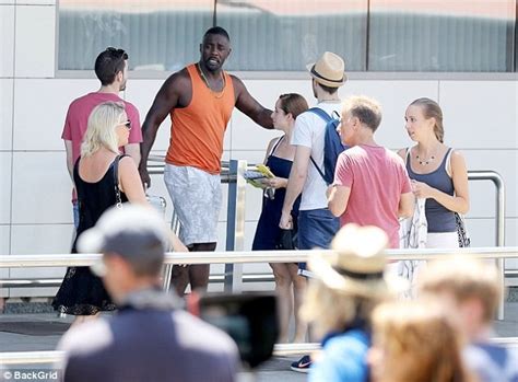 Idris Elba Shows Off His Buff Arms As He Films In Ibiza Airport Photos