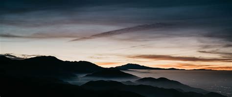 Download Mountains Sunset Fog Dawn Horizon Skyline Aerial View