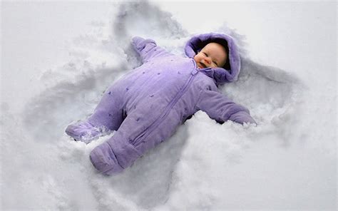 Baby Playing In Snow