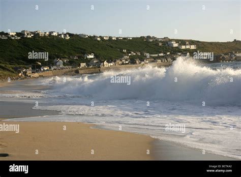 Area Of Sennen England Late Afternoon View Of Waves Breaking On