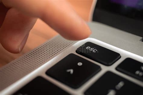 Hand Pressing Escape Key On Modern Laptop Keyboard Esc Sign And Symbol
