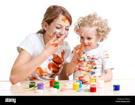 Mom And Kid Daughter Paint Together Stock Photo Alamy