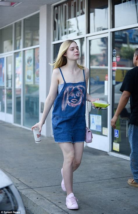 Elle Fanning Shows Off Her Unique Fashion Flare In Quirky Denim