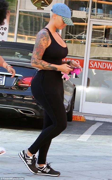 amber rose flaunts her curves in gym pants in los angeles daily mail online