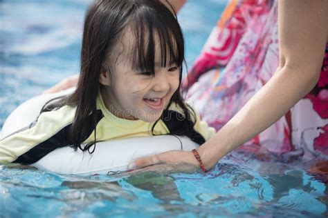 Asian Little Chinese Girl Playing In Swimming Pool Stock Image Image
